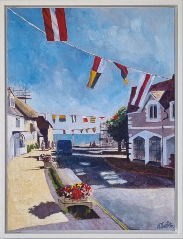 framed painting of high street with flags above